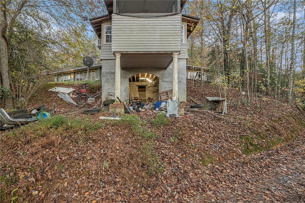 880 Golf Course Road Demorest, GA 30535 - Photo 34 of 37 a view of two chairs in a backyard