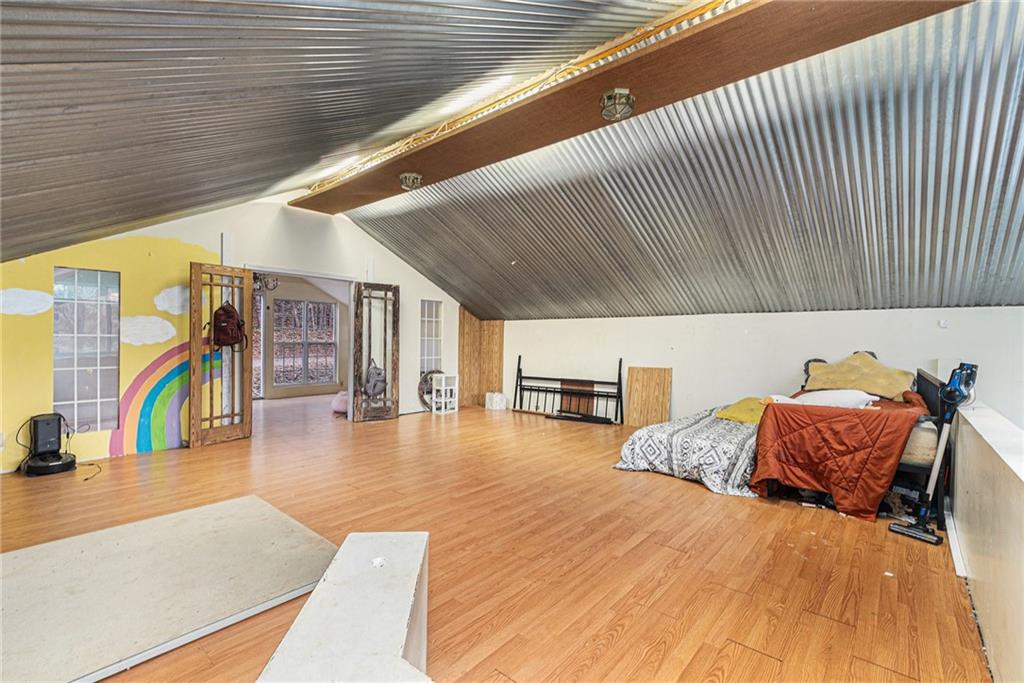 880 Golf Course Road Demorest, GA 30535 - Photo 8 of 37 a living room with furniture and a large window