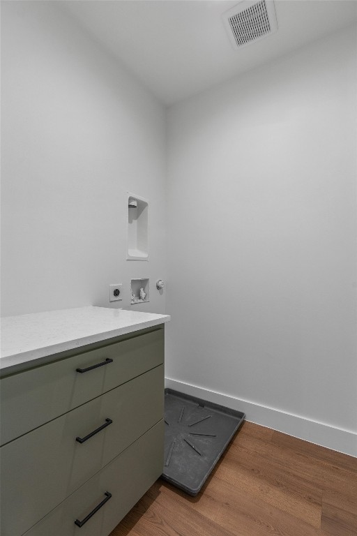 1402 Beckett Street, Unit 1B Austin, TX 78757 - Photo 22 of 32 a bathroom with a sink and vanity