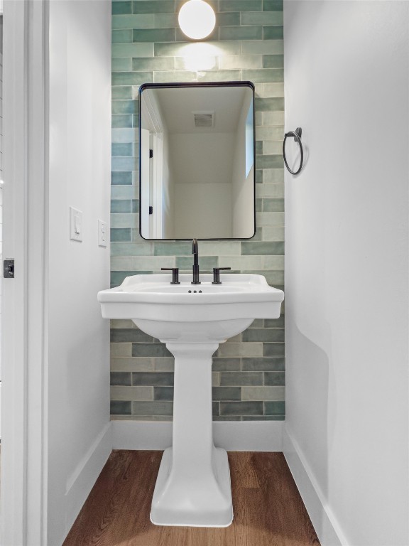 1402 Beckett Street, Unit 1B Austin, TX 78757 - Photo 8 of 32 a bathroom with a sink and a mirror