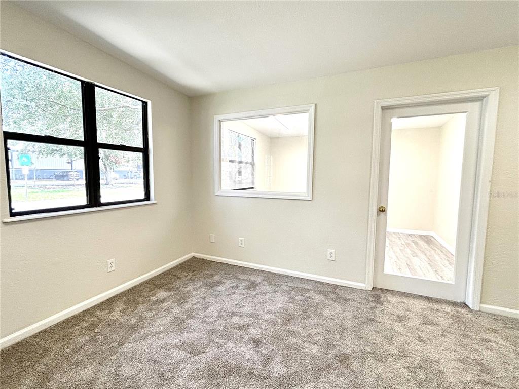2350 26th Street North St. Petersburg, FL 33713 - Photo 14 of 18 an empty room with windows