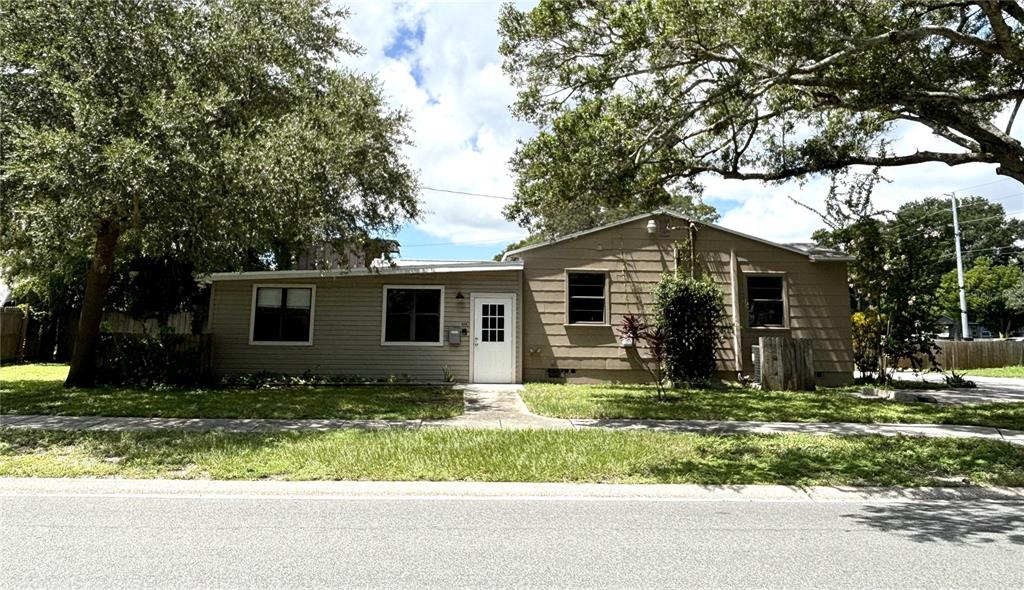 2350 26th Street North St. Petersburg, FL 33713 - Photo 2 of 18 a backyard of a house with yard and outdoor seating