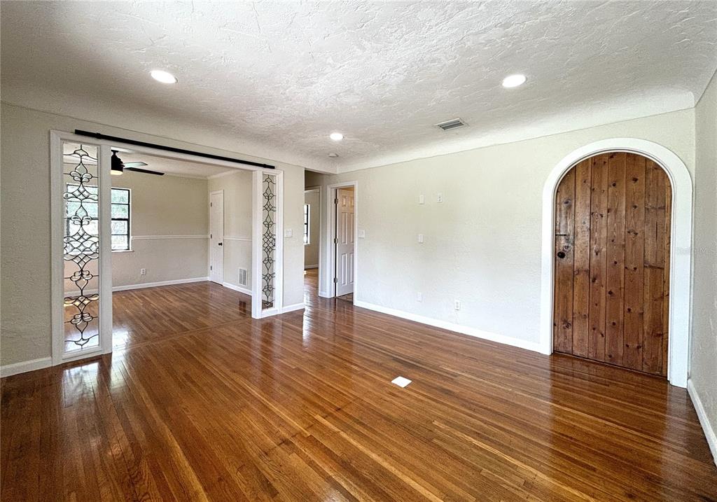 2350 26th Street North St. Petersburg, FL 33713 - Photo 5 of 18 a view of livingroom with hardwood floor and hallway