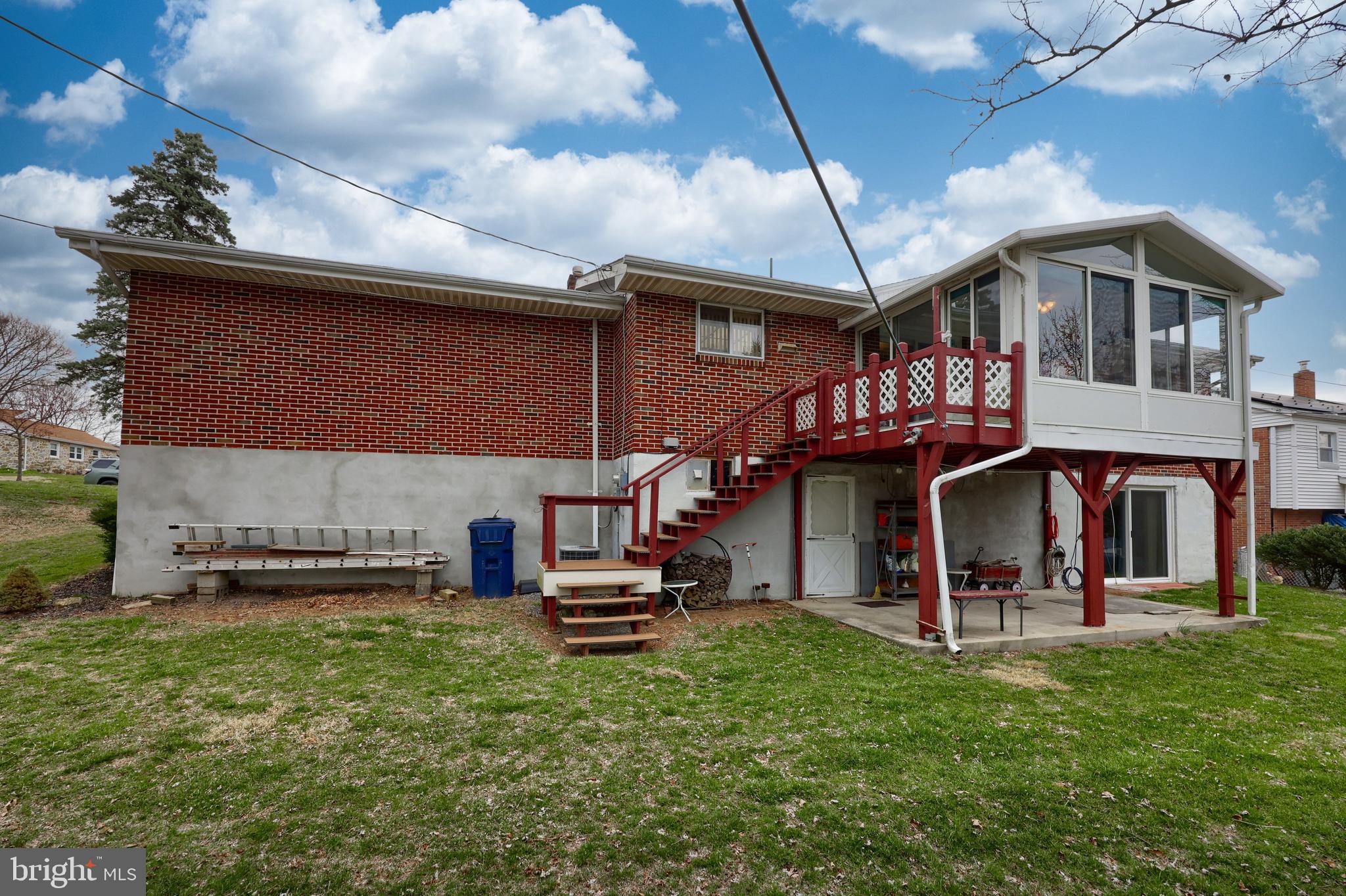 3916 Grant Street Reading, PA 19606 - Photo 11 of 39 a front view of a house with a garden