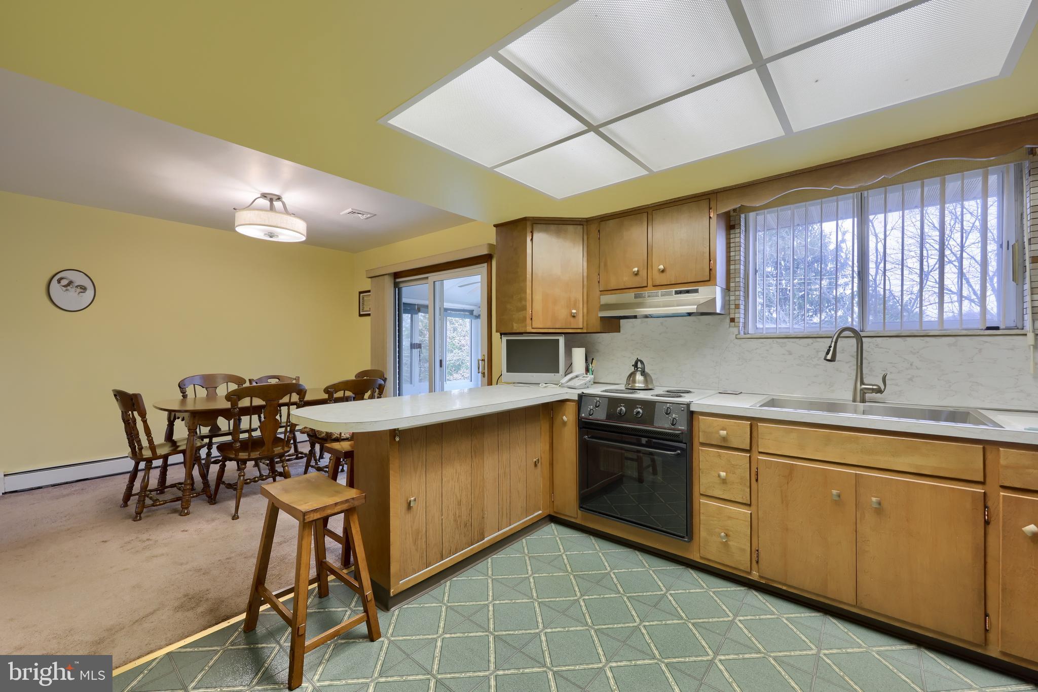 3916 Grant Street Reading, PA 19606 - Photo 23 of 39 a kitchen with a sink and cabinets