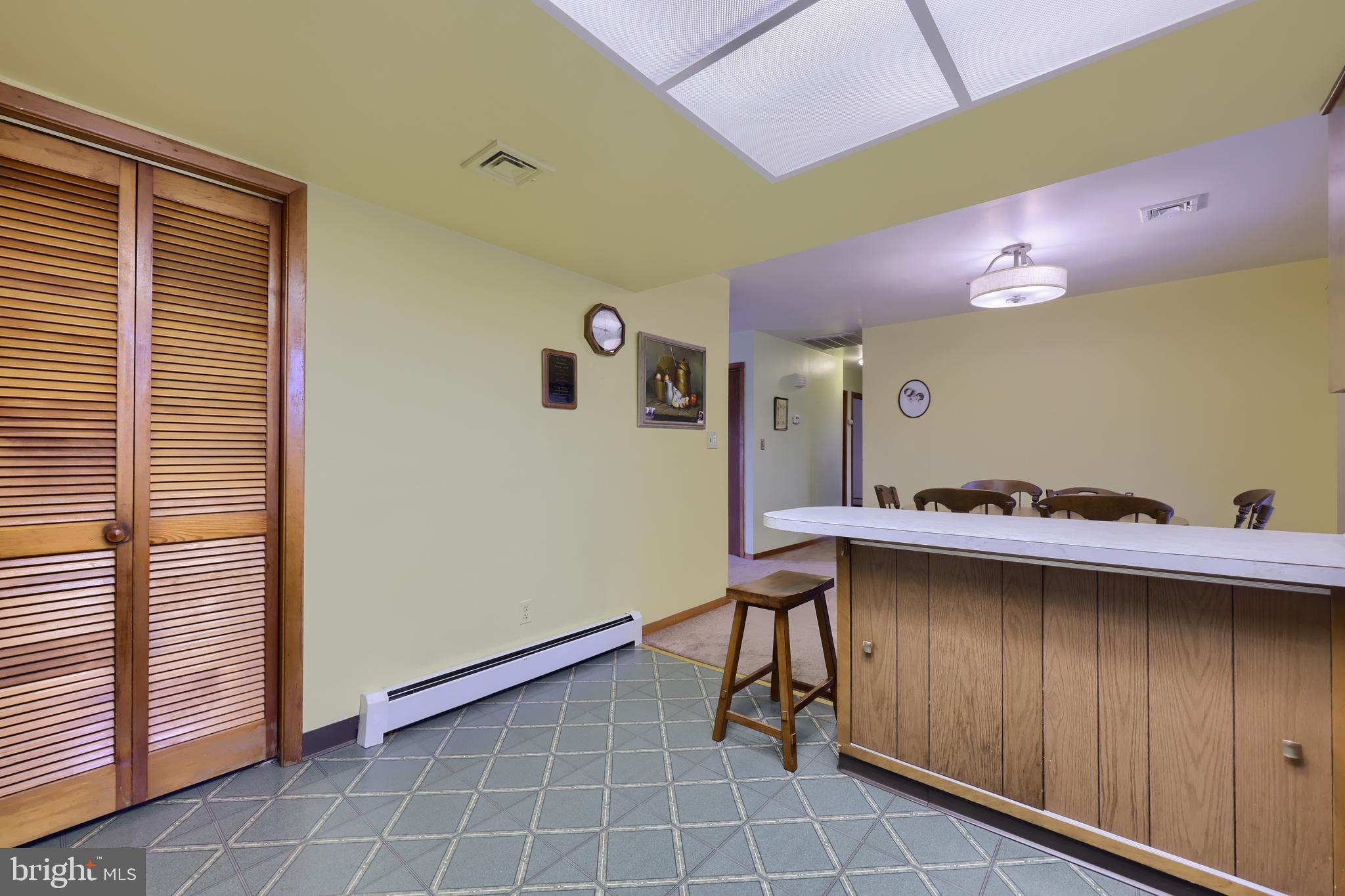 3916 Grant Street Reading, PA 19606 - Photo 24 of 39 a kitchen with stainless steel appliances a sink a stove and a window