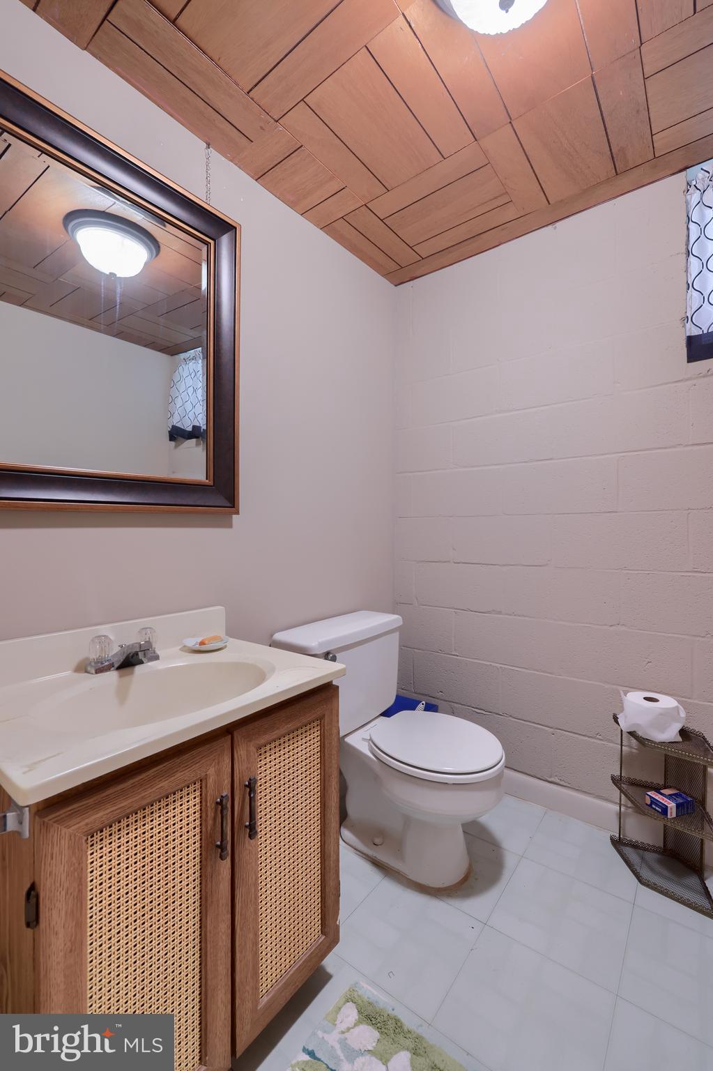 3916 Grant Street Reading, PA 19606 - Photo 32 of 39 a bathroom with a sink and a toilet