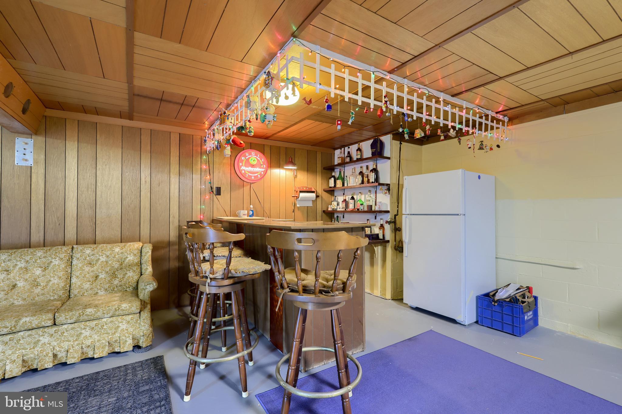 3916 Grant Street Reading, PA 19606 - Photo 34 of 39 a view of a dining room with furniture and wooden floor