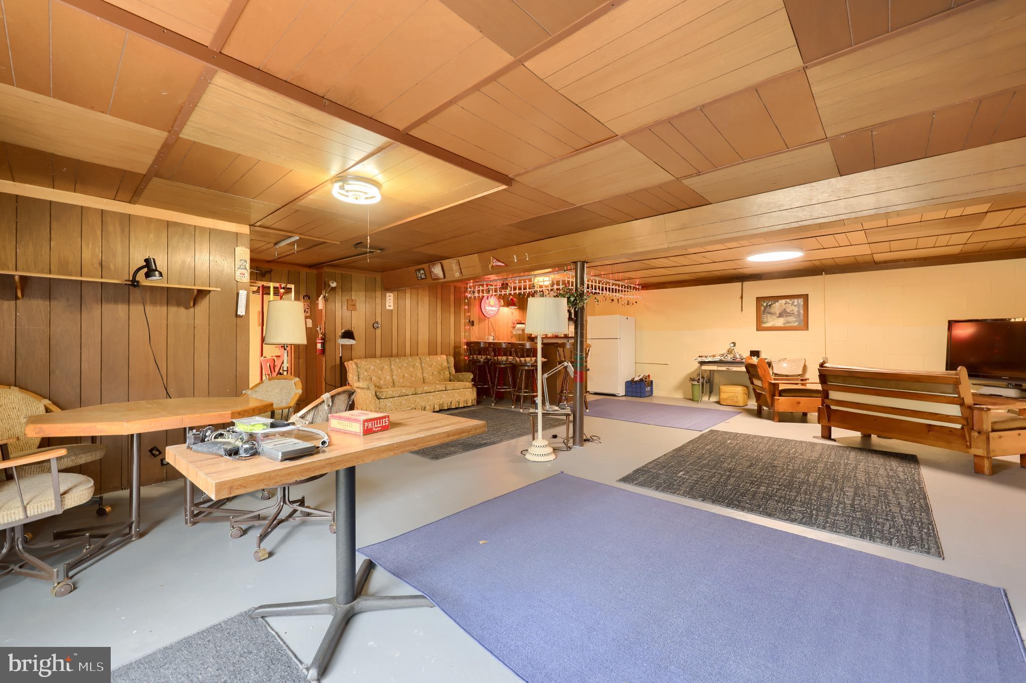 3916 Grant Street Reading, PA 19606 - Photo 37 of 39 a outdoor space with lots of chairs and mirrors