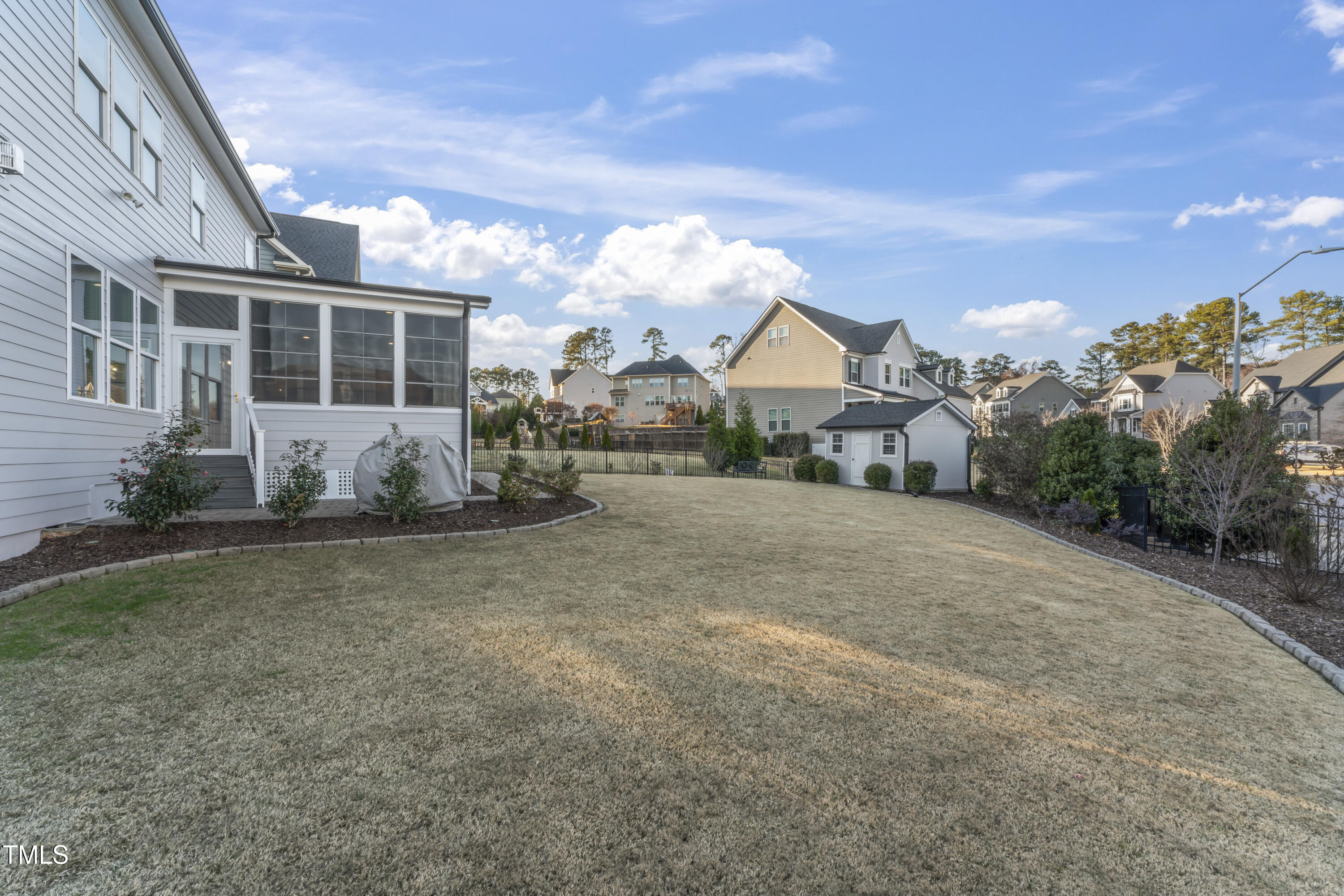 5244 Aleppo Lane Raleigh, NC 27613 - Photo 32 of 41 a view of a house with a yard