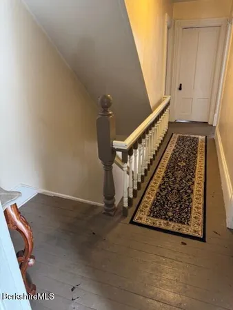 a view of entryway with stairs