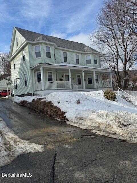 11 Melrose Street Adams, MA 01220 - Photo 19 of 21 a front view of a house with a yard