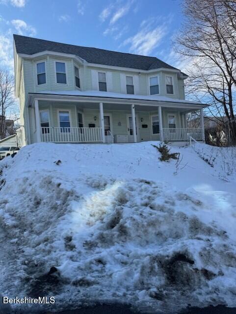11 Melrose Street Adams, MA 01220 - Photo 3 of 21 a view of a brick house with lots of trees