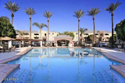 3302 North 7th Street, Unit 335 Phoenix, AZ 85014 - Photo 12 of 14 a view of a patio with swimming pool