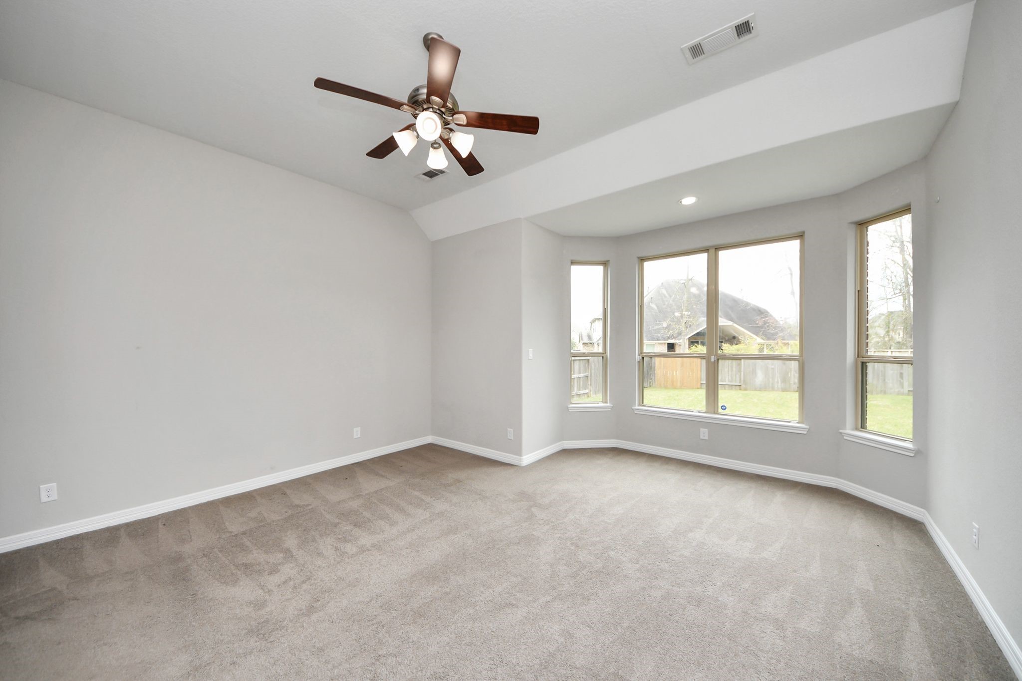 6002 Granite Shadow Lane Houston, TX 77365 - Photo 22 of 49 a view of an empty room with a window