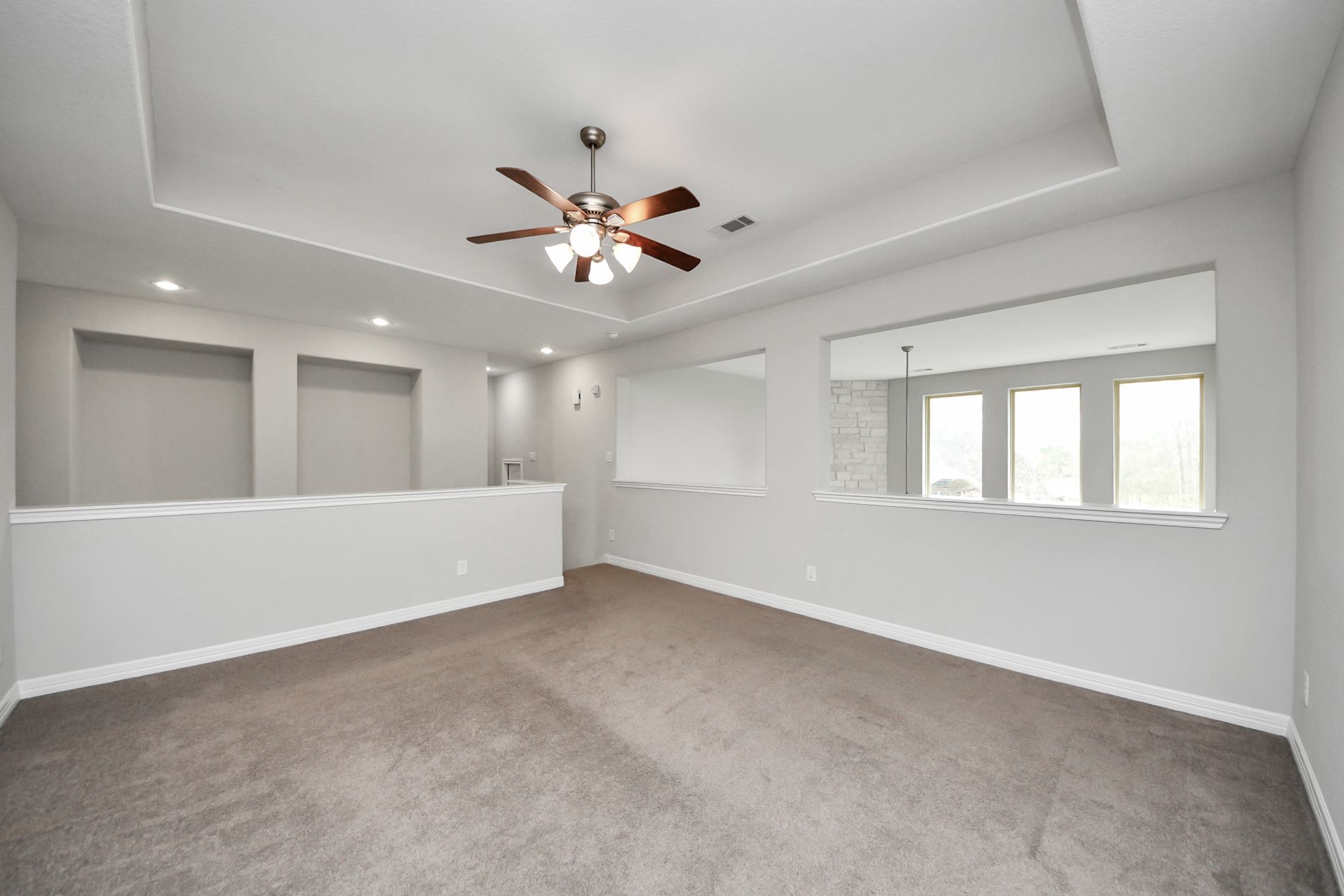6002 Granite Shadow Lane Houston, TX 77365 - Photo 29 of 49 a view of an empty room with a window