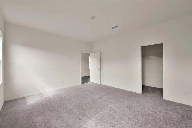 a view of a house with a yard and porch