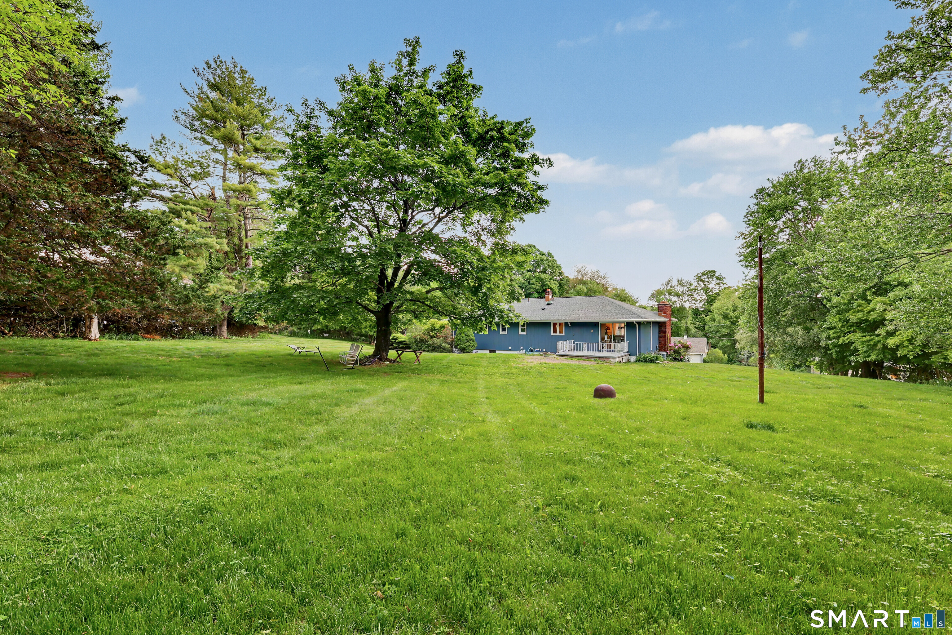 44 Haverhill Road Trumbull, CT 06611 - Photo 32 of 32 a view of a house with a yard