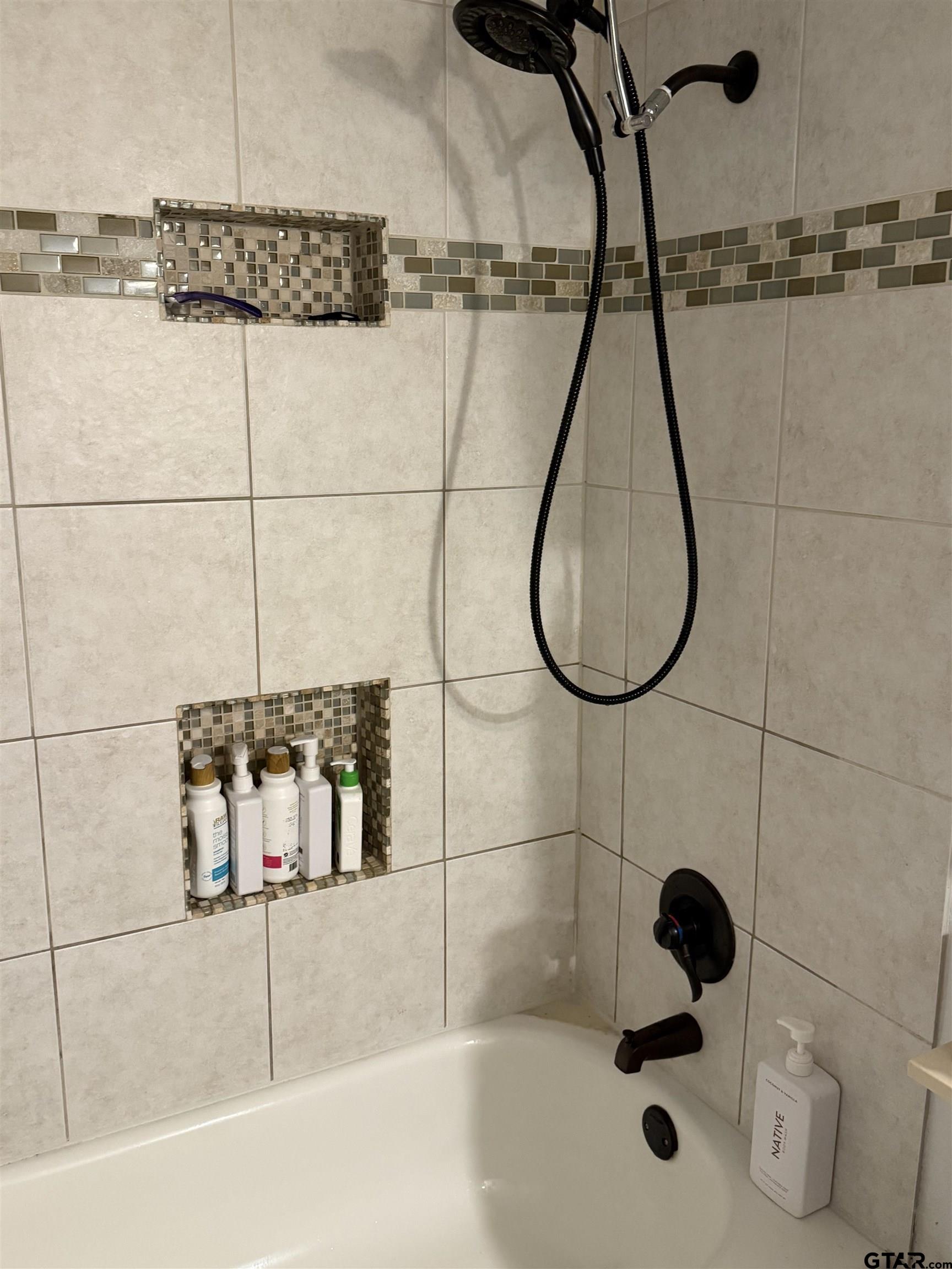 1740 Mill Creek Drive Tyler, TX 75703 - Photo 14 of 19 a bathroom with a shower