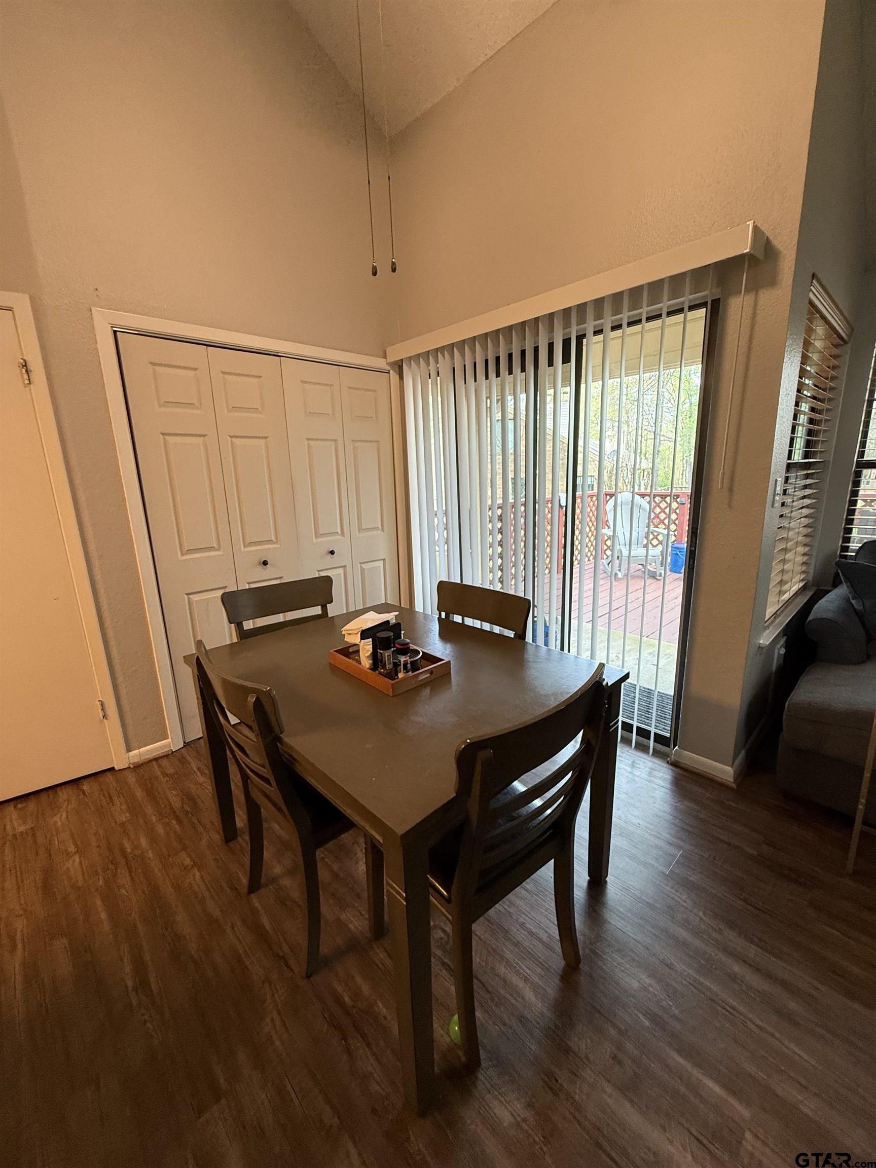 1740 Mill Creek Drive Tyler, TX 75703 - Photo 5 of 19 a view of a dining room with furniture window and wooden floor