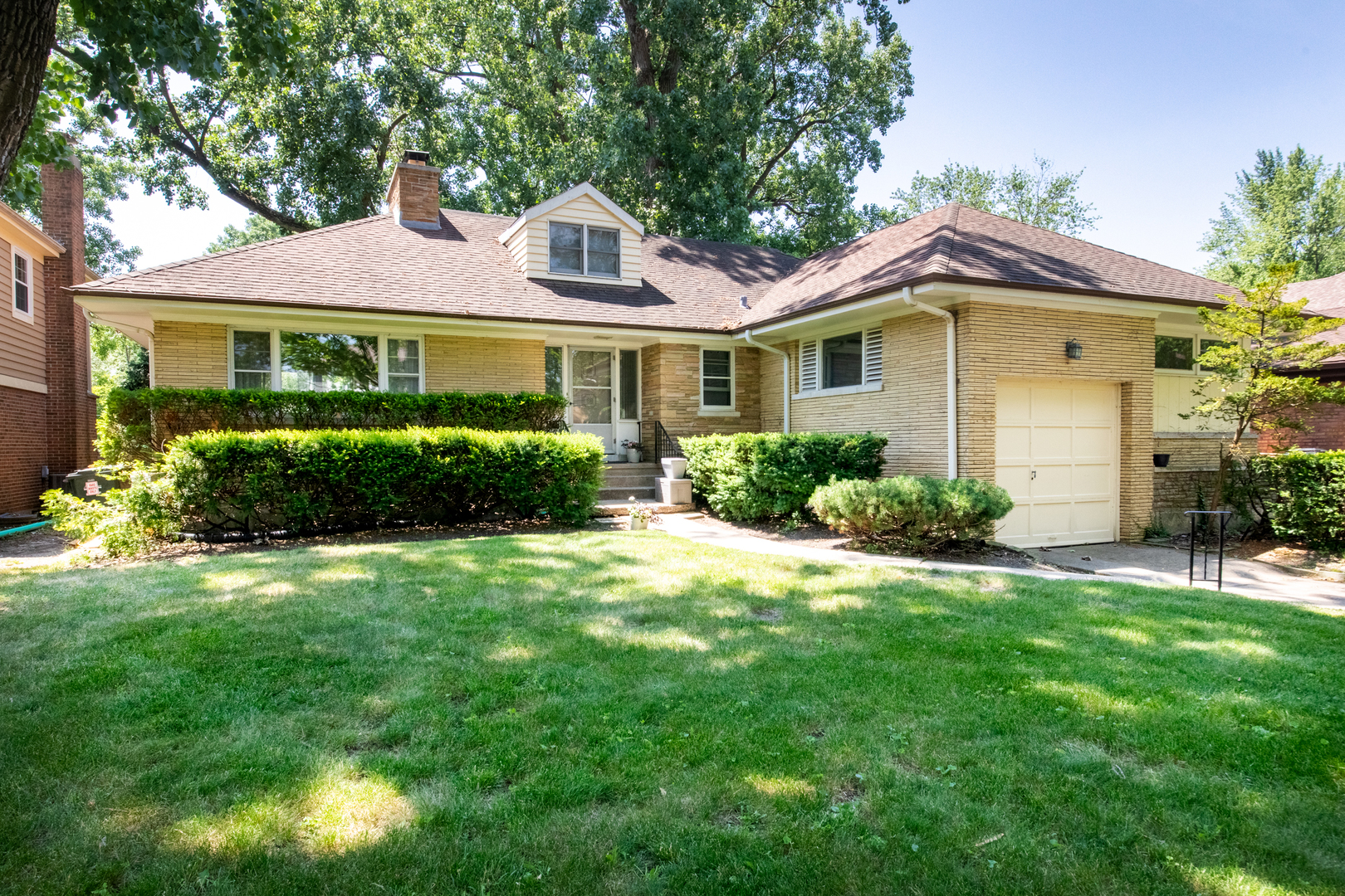 519 Austin Avenue Park Ridge, IL 60068 - Photo 1 of 1 a front view of a house with a yard
