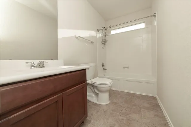 a bathroom with a sink a vanity and mirror