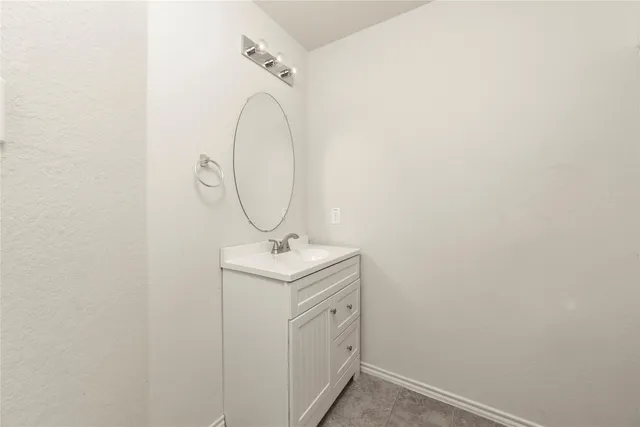 a bathroom with a sink and a yard