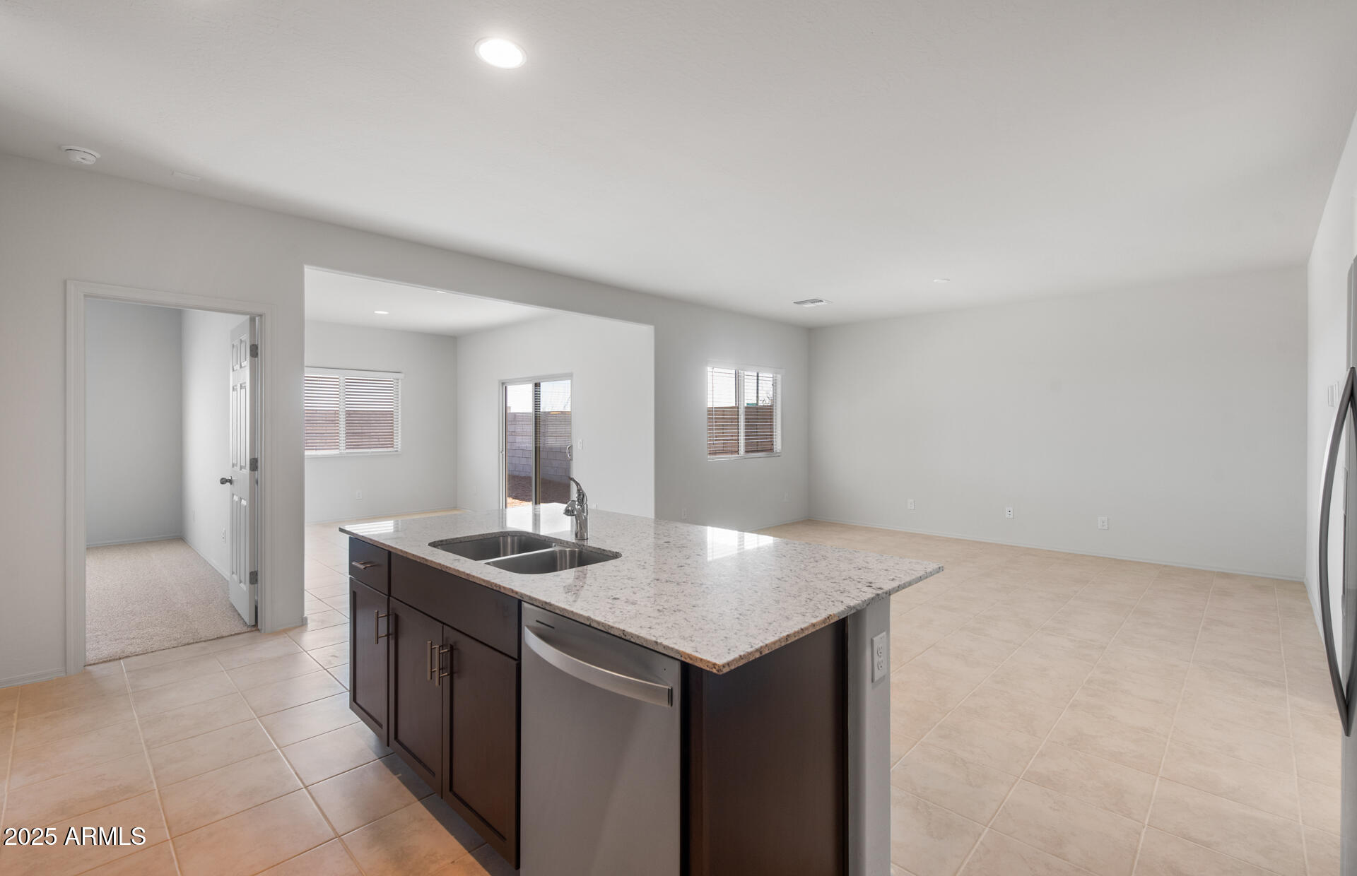 25428 West Romley Road Buckeye, AZ 85326 - Photo 7 of 24 5 - Kitchen and Gathering Area