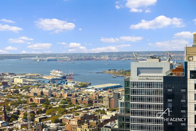 a view of a city with tall buildings