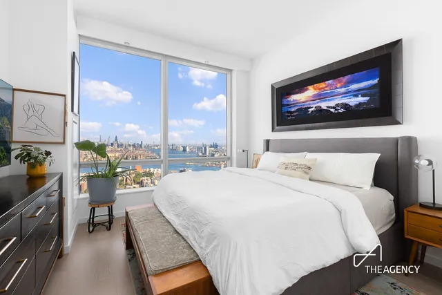 a kitchen with a sink a stove and chairs
