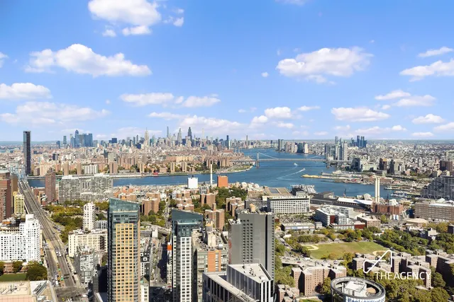 a view of a city with tall buildings