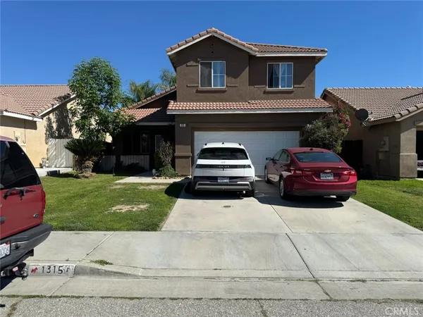 a car parked in front of a house