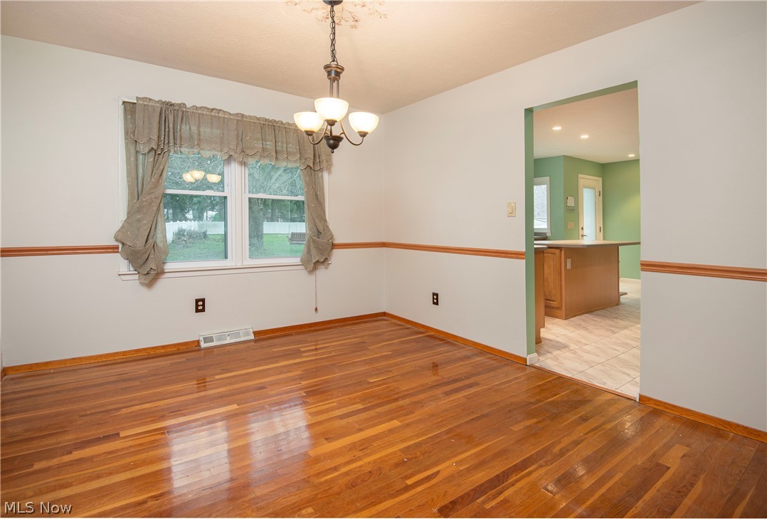 38898 Johnnycake Ridge Road Willoughby, OH 44094 - Photo 2 of 8 Spacious Dining Room looking into Kitchen