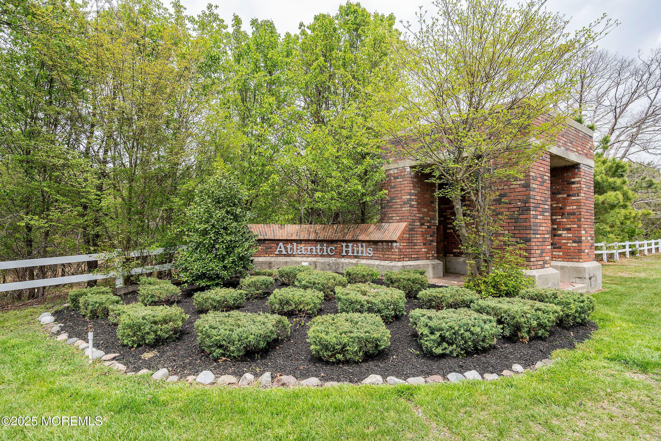 10 Hampton Road Manahawkin, NJ 08050 - Photo 16 of 38 a view of a house with a backyard and a tree