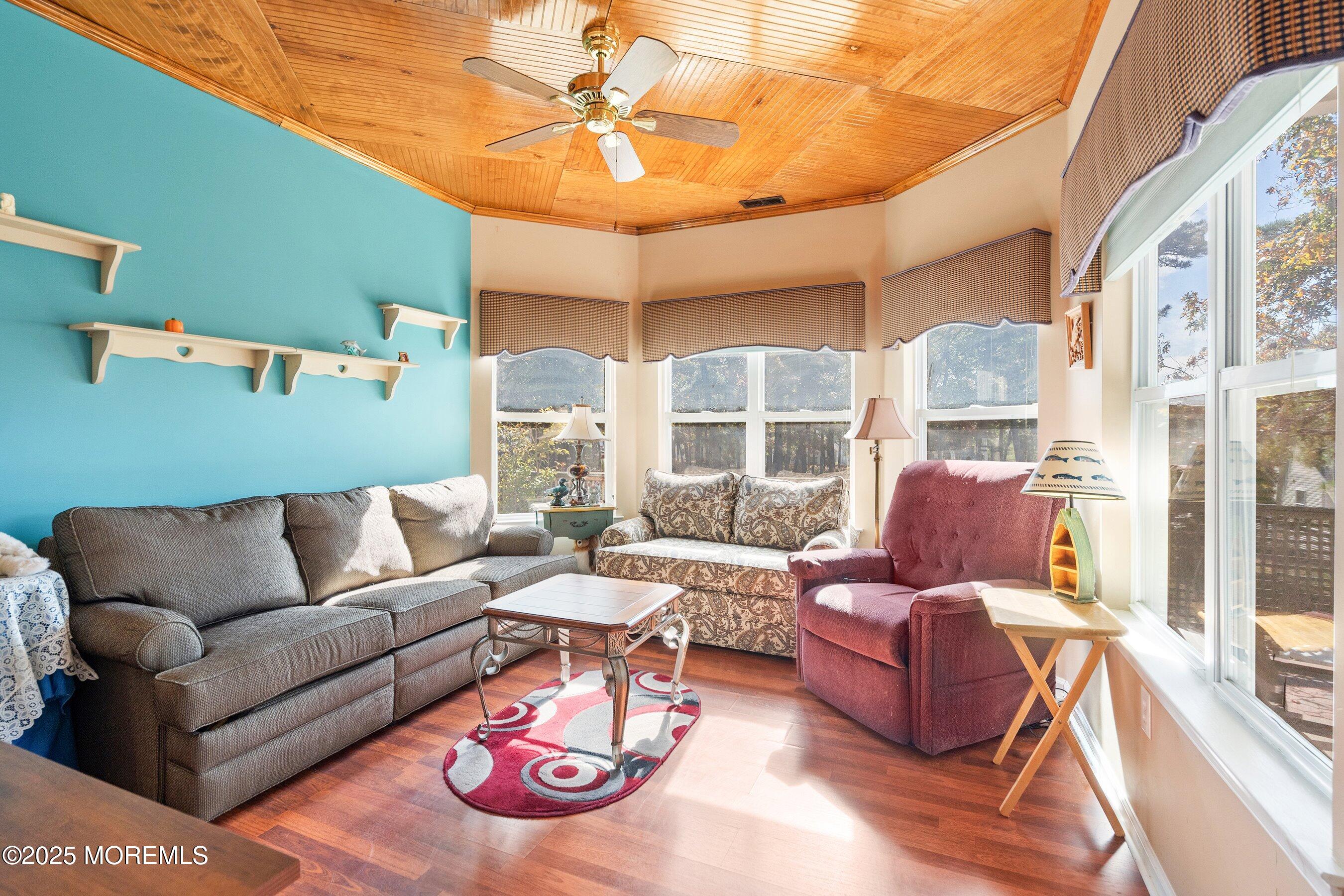 10 Hampton Road Manahawkin, NJ 08050 - Photo 27 of 38 a living room with furniture and a large window