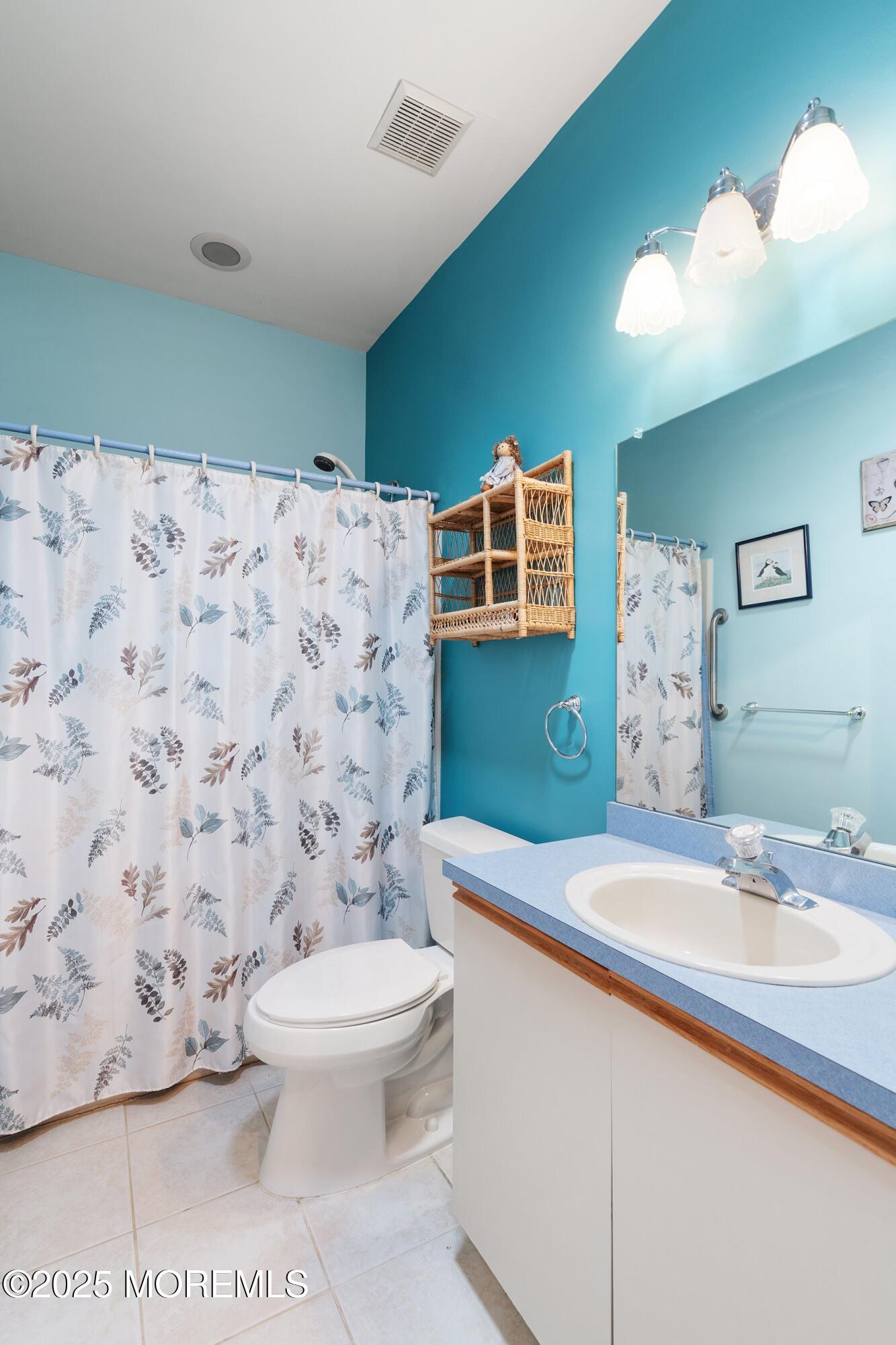 10 Hampton Road Manahawkin, NJ 08050 - Photo 29 of 38 a bathroom with a sink toilet and shower