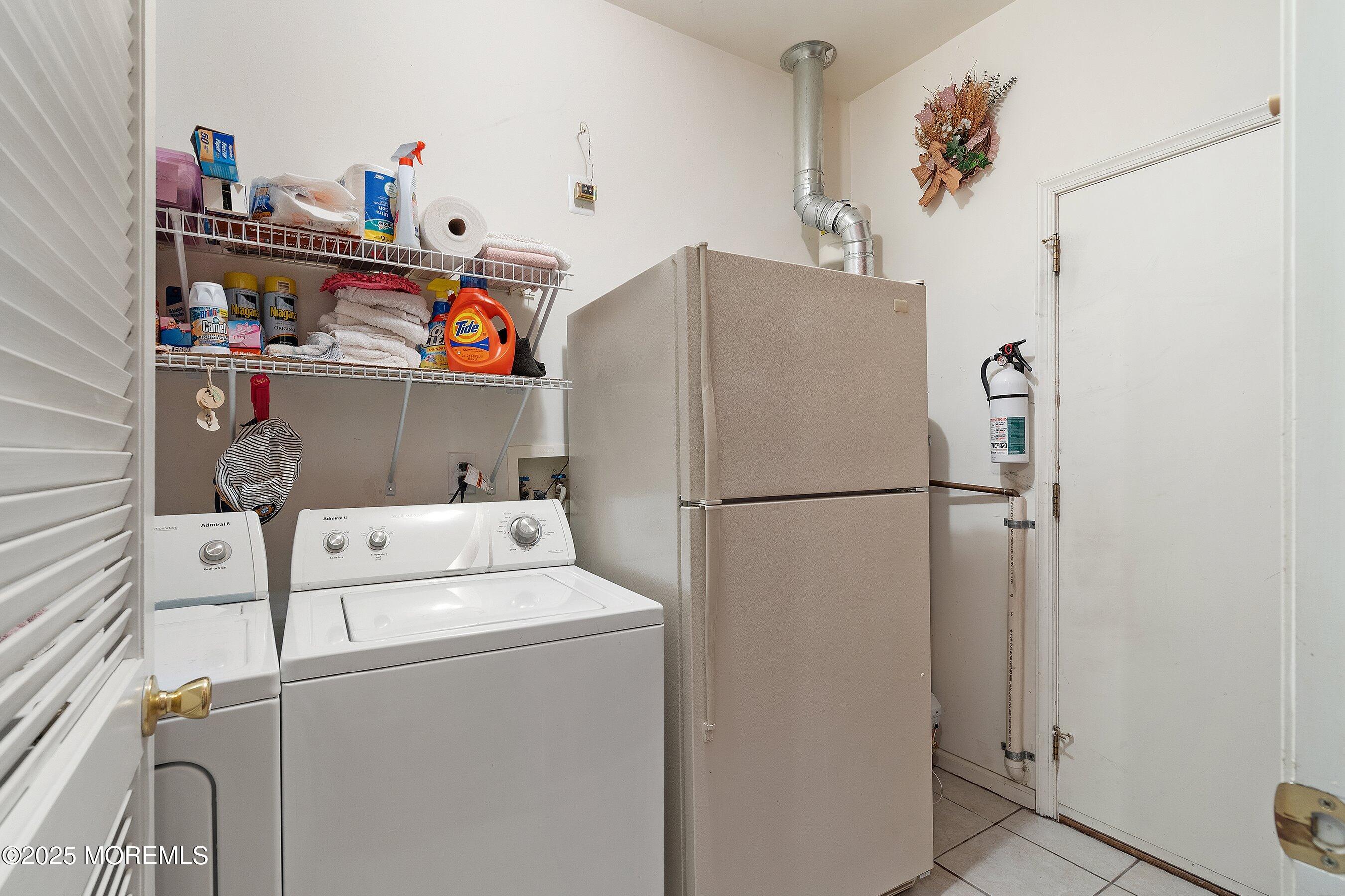10 Hampton Road Manahawkin, NJ 08050 - Photo 30 of 38 a utility room with dryer and washer
