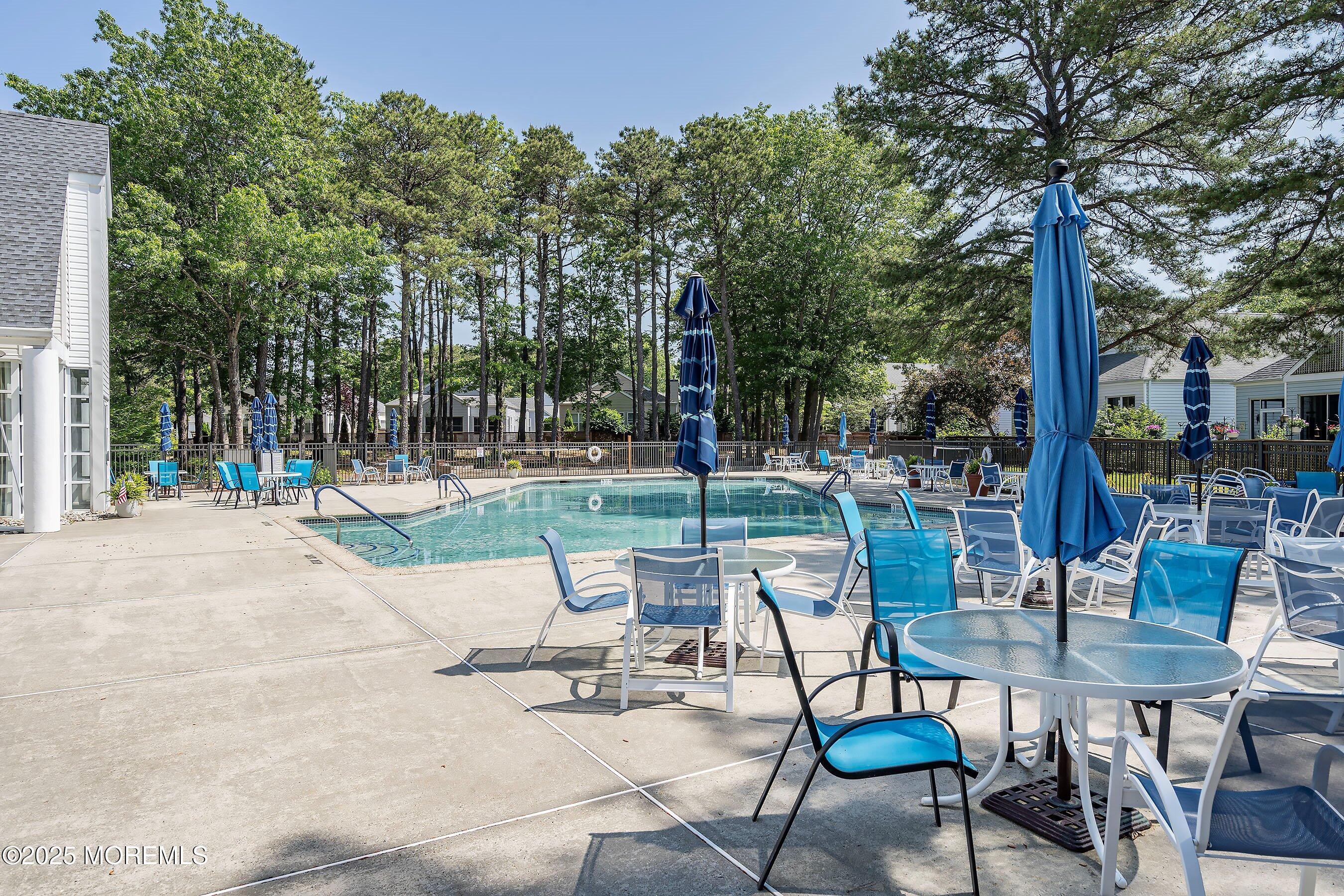 10 Hampton Road Manahawkin, NJ 08050 - Photo 36 of 38 a view of a chairs and tables in the patio