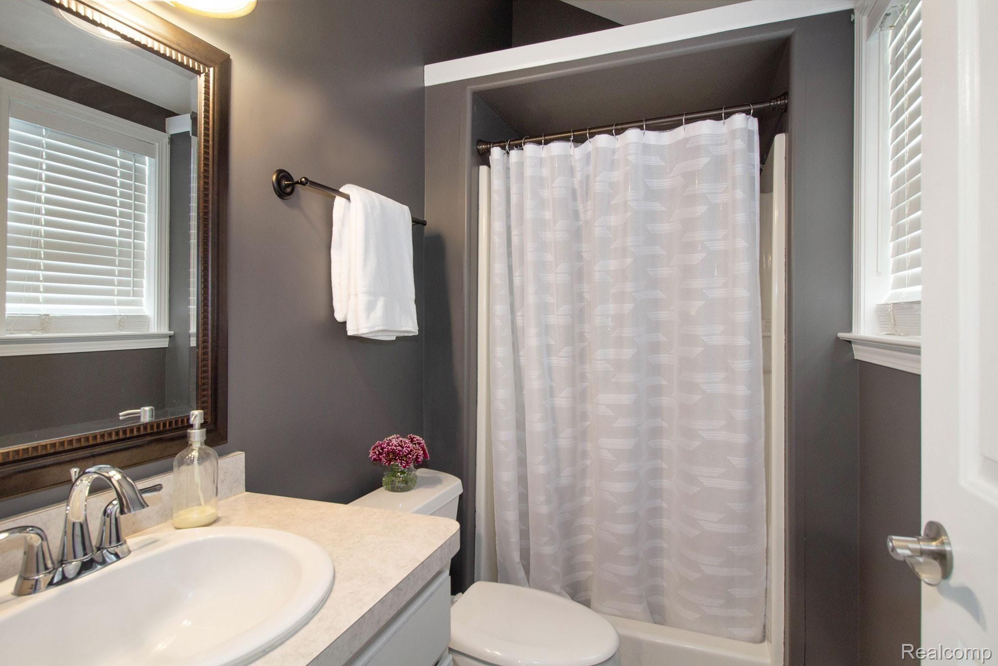 3950 Cemetery Road Fowlerville, MI 48836 - Photo 18 of 24 Full Bathroom on Main Level, Across from Laundry Area
