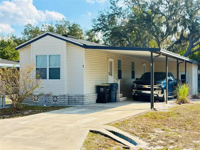 a view of a house with a patio