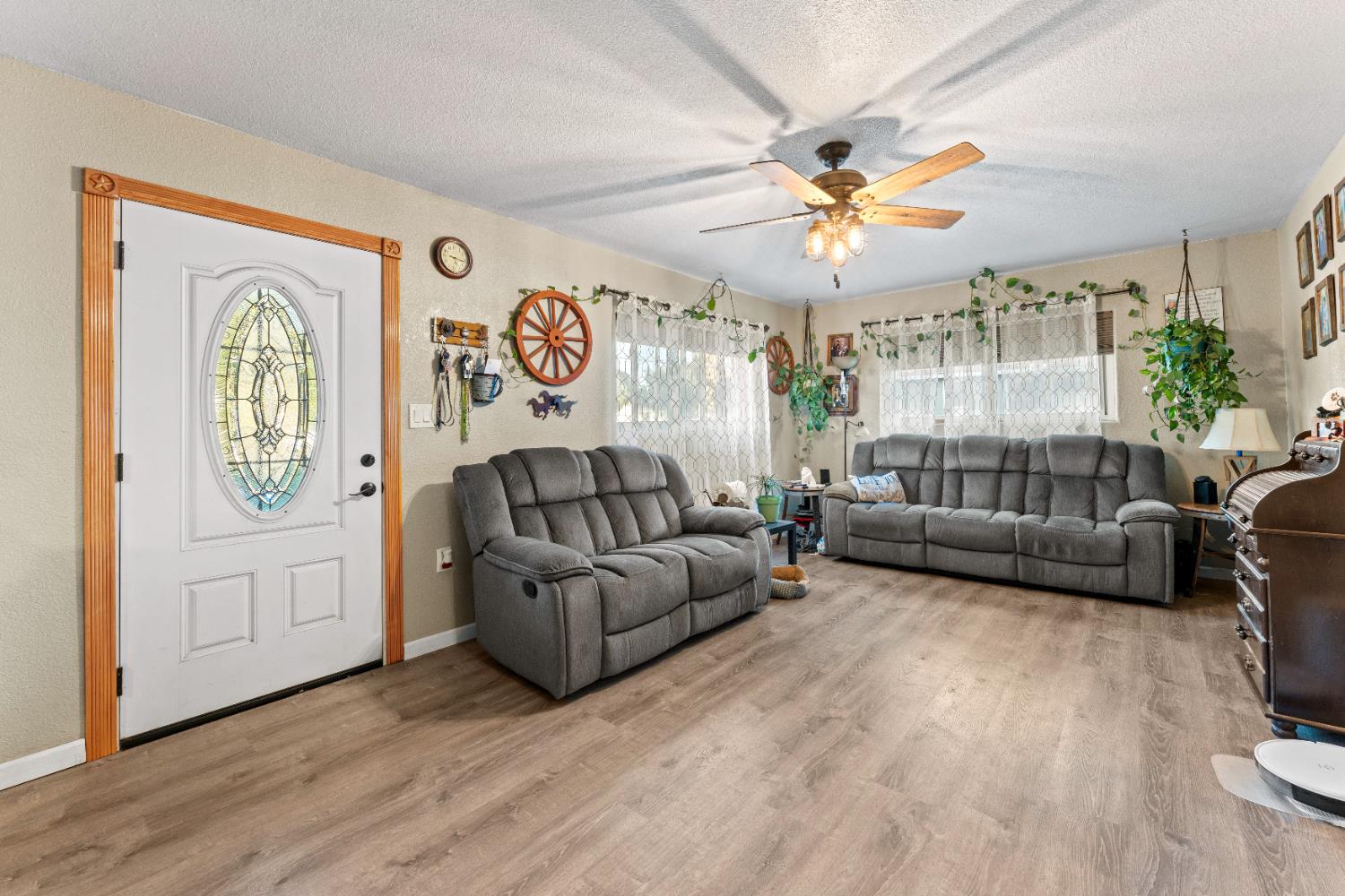 5912 Grove Avenue Marysville, CA 95901 - Photo 11 of 23 a living room with furniture and a large window