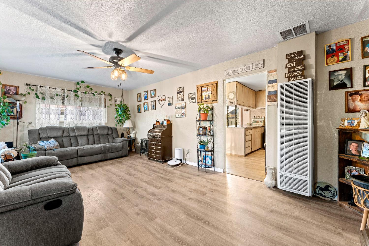 5912 Grove Avenue Marysville, CA 95901 - Photo 12 of 23 a view of a livingroom with furniture and a ceiling fan