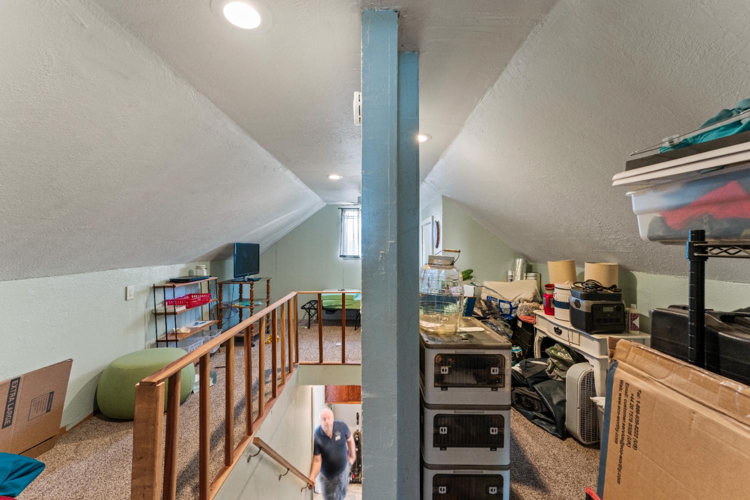 5912 Grove Avenue Marysville, CA 95901 - Photo 16 of 23 a view of a hallway with a kitchen