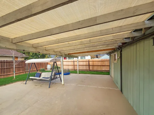 a view of a room with wooden walls