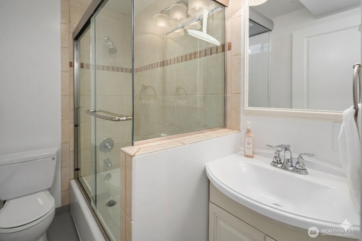 4014 Southwest 98th Street Seattle, WA 98136 - Photo 26 of 36 a bathroom with a sink a toilet and shower