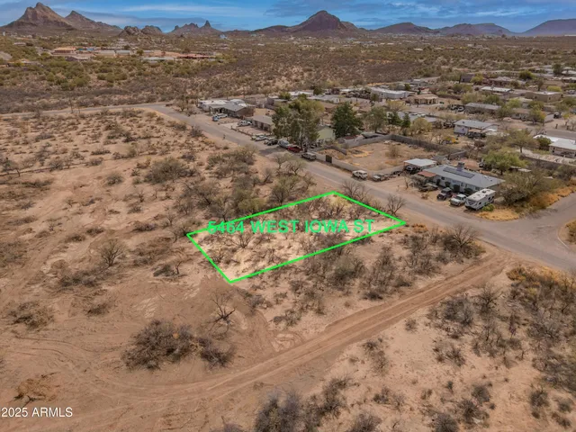 a view of a field with a mountain