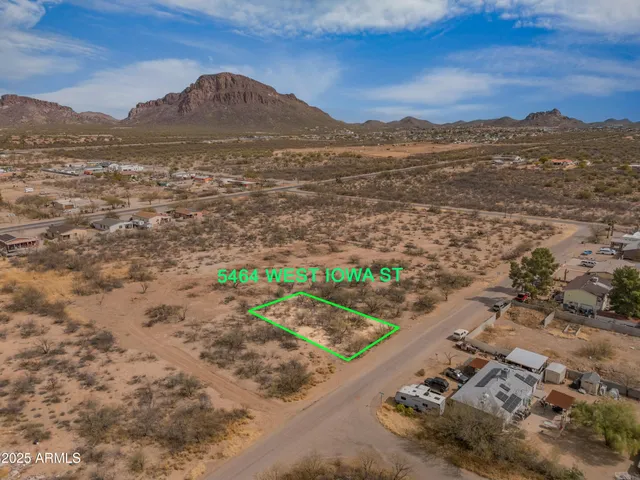 a view of a city with mountains in the background