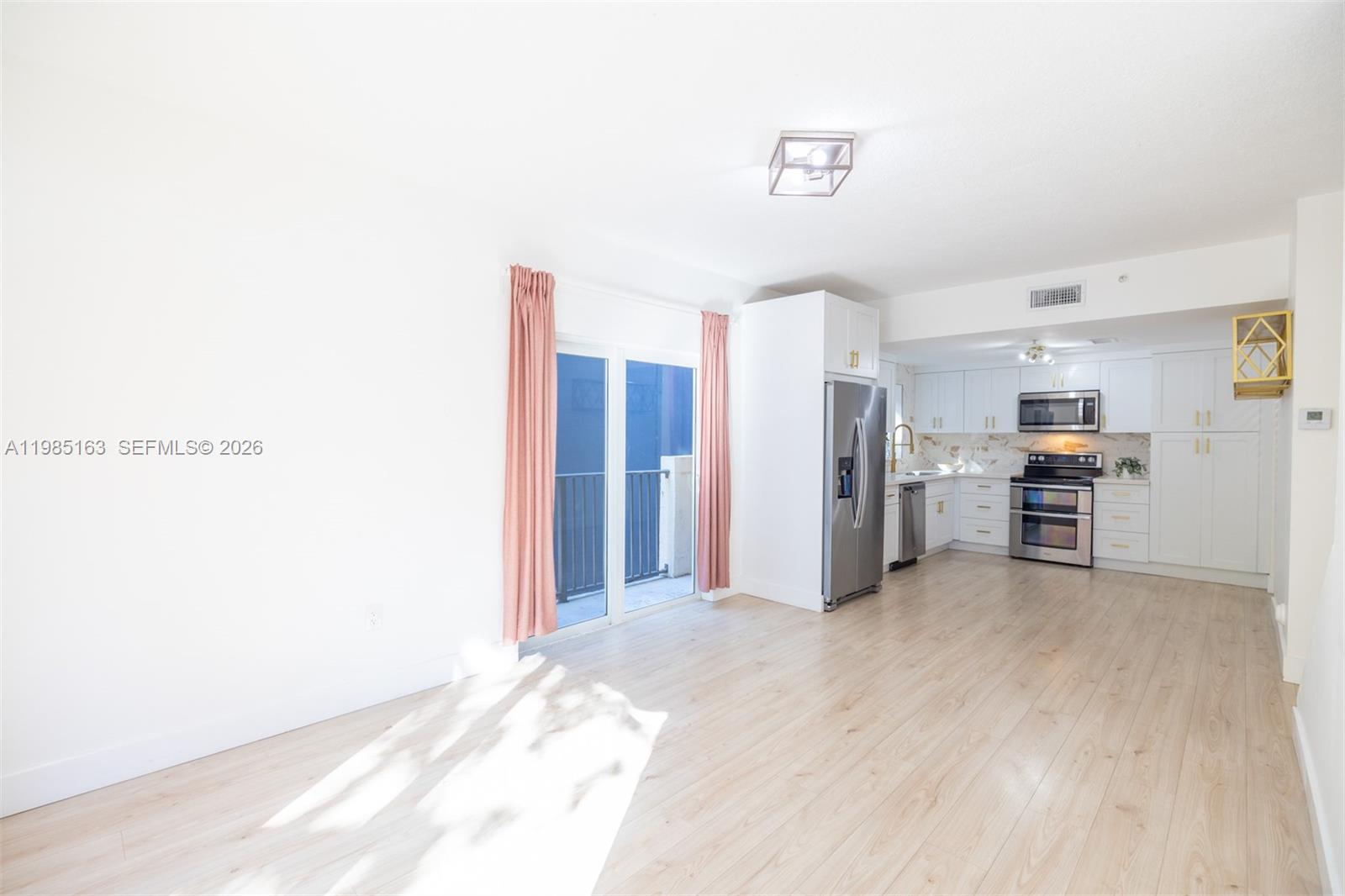 1611 Southwest 2nd Court, Unit AA112 Miami, FL 33129 - Photo 13 of 30 Living/Dining Area
