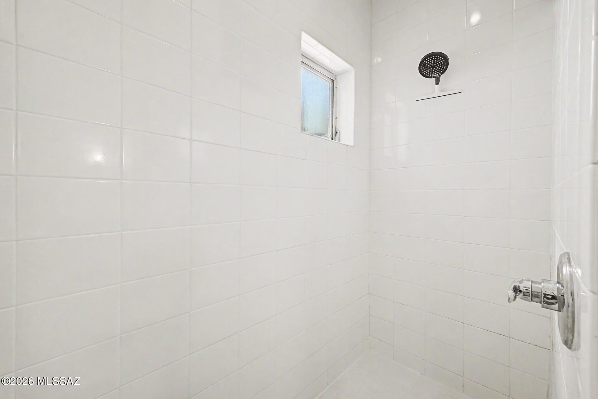 3605 East 3rd Street Tucson, AZ 85716 - Photo 24 of 39 Second floor bathroom features a large walk-in shower.