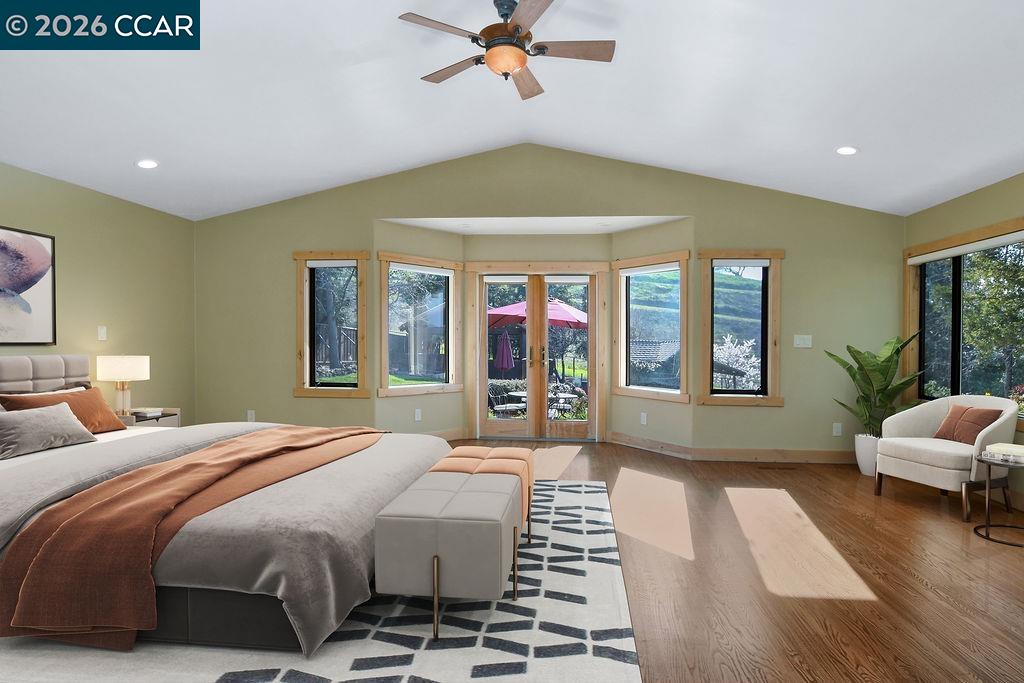 5308 Vista Point Court Concord, CA 94521 - Photo 11 of 56 a spacious bedroom with a bed a mirror and a large window